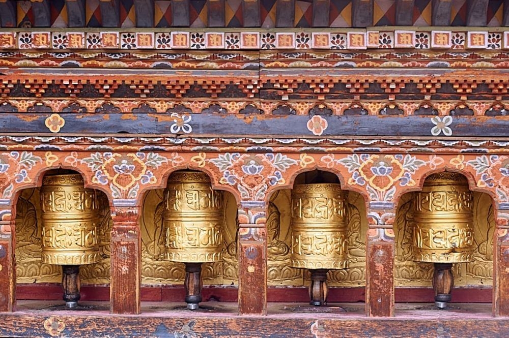 Shantanobhobhutan_buddha_prayer_wheels-1000x665.jpg